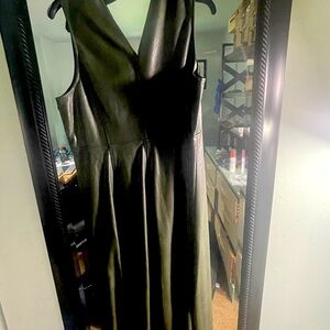 Forest green vegan leather midi /. HOT. Never worn size 16 fits like size 14.